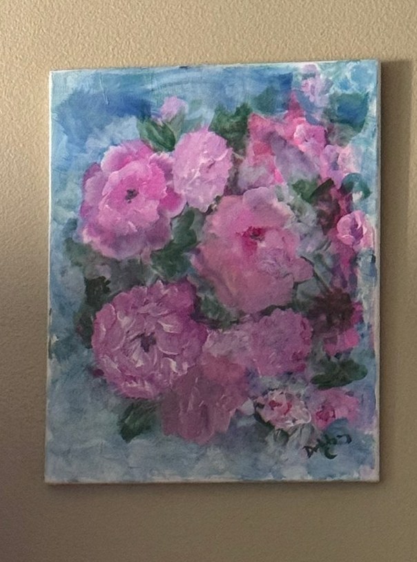 Pink peonies are visible.